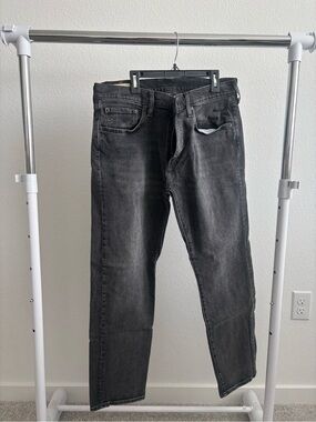 Levi's Black Washed Denim Jeans with Tan Leather Patch